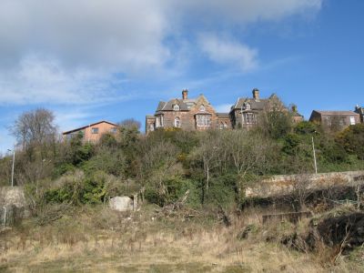 A gap in the High Street where the old Palace cinema used to be affords a unique view of the ridge of Broomhill